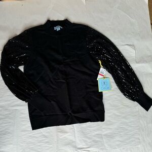 Woman’s black sweater blouse
